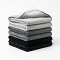 Plush cleaning cloth stack on white background